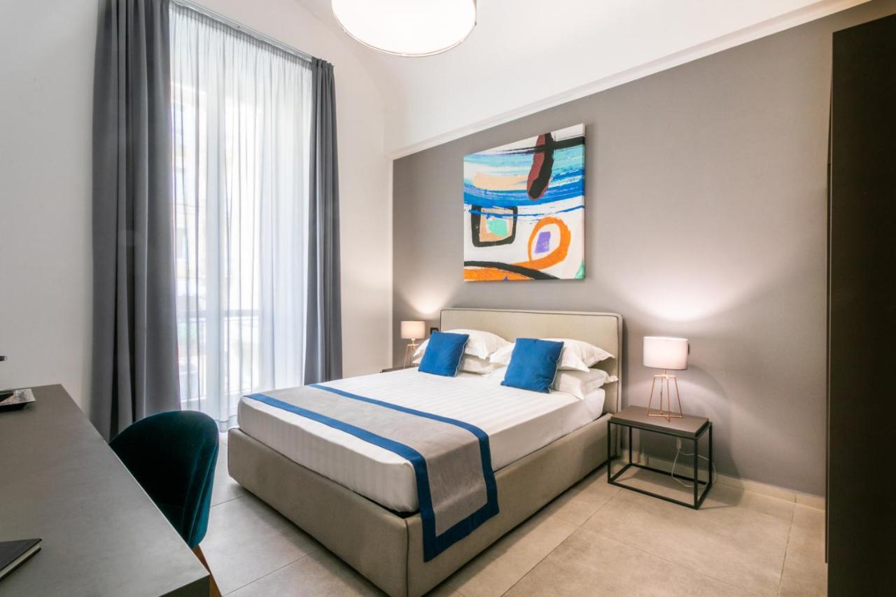 Bespoke Roma Suites ภายนอก รูปภาพ